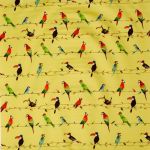 Toucan Talk in Zest 575 by Prestigious Textiles